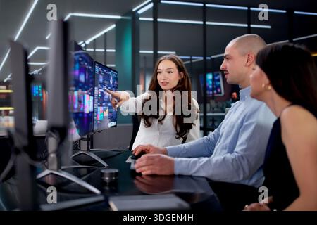 Analyzing KPIs On Computer Dashboard: A Business Marketing Team's Task Stock Photo