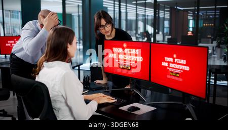 Tech-savvy Businessman Prevents Ransomware Cyber Attack Using Malware Encryption Stock Photo