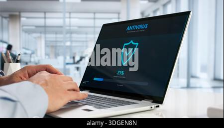Young Hispanic Man Browsing Online With Secure Cybersecurity Software Protection. Stock Photo