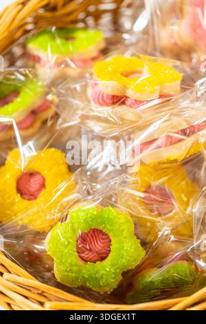 Wrapped Easter Cookie Sandwiches in Basket Stock Photo