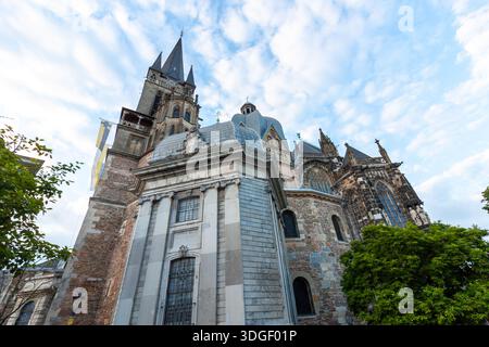 AACHEN, GERMANY - MAY 31, 2024: Low angle view of the Aachen Cathedral (Aachener Dom) in Germany. Majestic UNESCO World Heritage site featuring the we Stock Photo