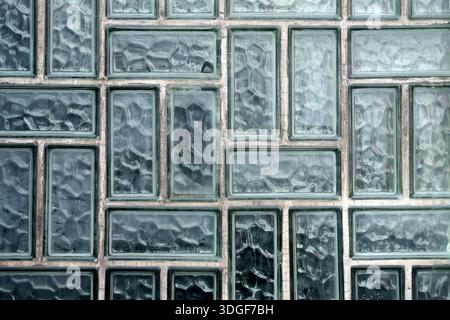 Pattern of vintage glass bricks in a wall. Abstract architectural texture with geometric structure, ideal for backgrounds, design Stock Photo
