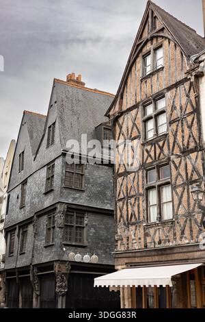 Historic black slate covered house and half-timbered building stand on Place Plumereau in Tours France creating a beautiful medieval city architecture Stock Photo