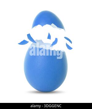 Cracked dyed Easter egg on white background Stock Photo