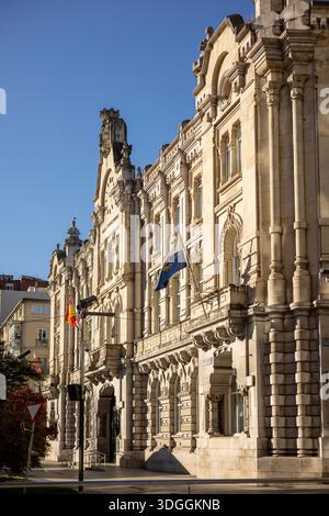 Santander, Spain – Nov 19, 2021: The ornate facade of the Santander City Hall (Ayuntamiento) on the Plaza del Ayuntamiento, with Spanish and Cantabria Stock Photo