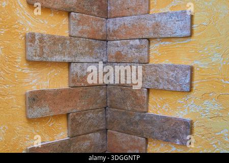 in the corner of the wall laid decorative tiles in the room in the kitchen Stock Photo