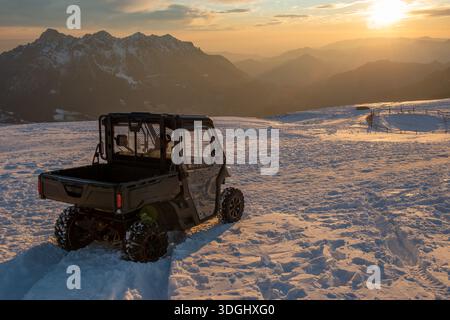 Off-road vehicle with integrated traction for travelling on snow Stock Photo