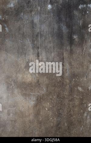 Front view of dirty and weathered wall with scratches on the surface. Abstract full frame textured grunge background with copy space. Stock Photo