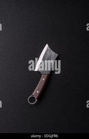 A kitchen cleaver or butcher's knife for cutting meat. A butcher's cleaver as a food background for your design Stock Photo