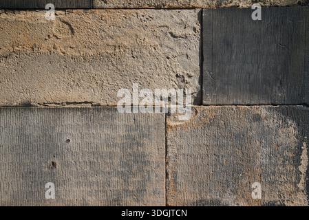 Detailed view of large, clean-cut stone blocks in contrasting neutral tones. Perfect for high-end architectural rendering and structural references. Stock Photo