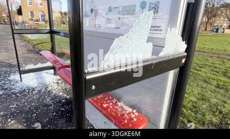 LONDON, UK -17th January, 2026: A bus stop at Blackheath Park stands as a hollow metal frame after its glass panels were completely shattered by vandals. Pedestrians and shoppers are seen navigating the shards of tempered glass covering the pavement before the site was cleared and cordoned off with red and white hazard tape. Images include a London double-decker bus departing the damaged stop, highlighting the ongoing disruption to public transport and local residents in South East London. Credit: Xiu Bao/17�Թ����� Live News Stock Photo