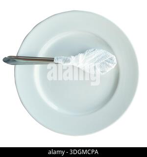 Top view of white plate with teaspoon is isolated on white background with clipping path. Stock Photo