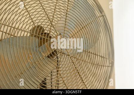 Close up of a very old and dusty industrial electric fan Stock Photo