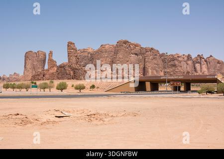Al Ula, Saudi Arabia - 24 April 2025: Road junction in Al Ula leading to Winter Park with rocky mountains in the background set in the desert landscap Stock Photo