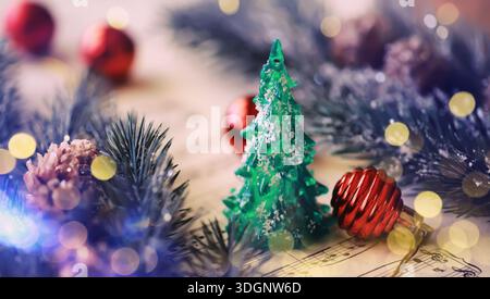 Christmas Sheet Music. Christmas decorations on music sheets Stock Photo