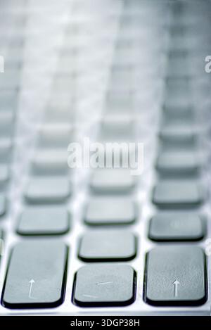 Selective focus shot of keyboard keys, digital technology and typing concept. Stock Photo