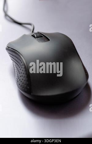 Modern wired computer mouse isolated on white, office equipment and technology accessory. Stock Photo
