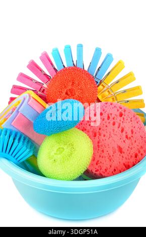 Set of sponges and brushes for home cleaning isolated on a white background. Stock Photo