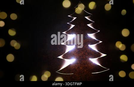 Christmas tree paper cutting design card. Christmas tree paper craft. Stock Photo