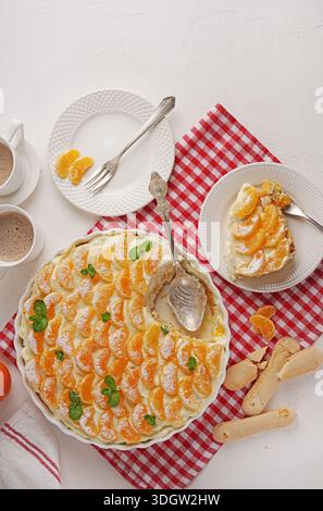 Tangerine tiramisu orange tiramisu on the table Stock Photo