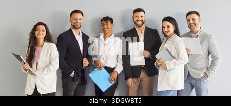Group of happy diverse business people being friendly colleagues Stock Photo