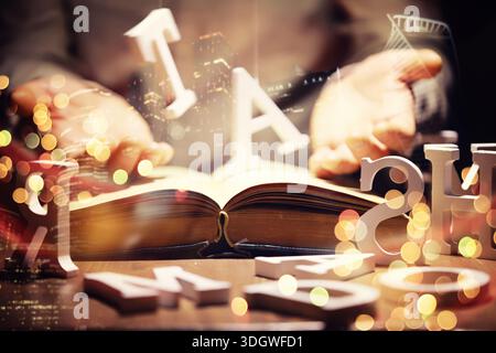 Close up of an unrecognizable man holding a book standing against a morning city panorama. Mock up, toned image, double exposure Stock Photo