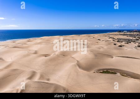 Aerial Maspalomas Dunes and Atlantic Horizon with Maspalomas Lighthouse Stock Photo