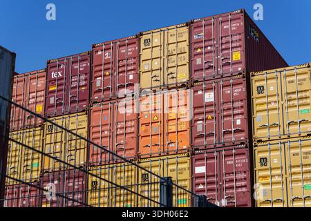 Stacks of colorful shipping containers rise high at Neuss harbor area ...