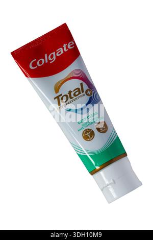 Tube of Colgate Total Active Prevention toothpaste with tube removed isolated on white background Stock Photo
