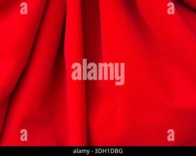 Red textile fabric bright background Stock Photo