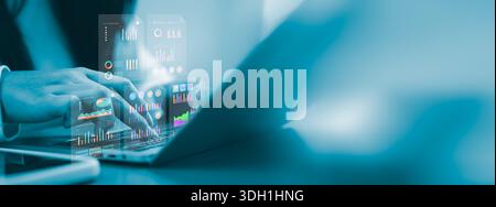 Businessman hands typing on laptop with virtual data analytics dashboard. Financial report, business intelligence, marketing statistics and digital ch Stock Photo