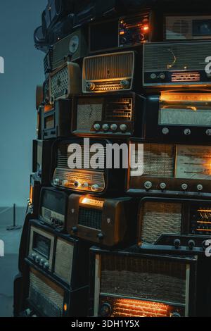 Close-up of stacked vintage radios with lighting effects, Tate Modern of Art, Lodon, United Kingdom Stock Photo