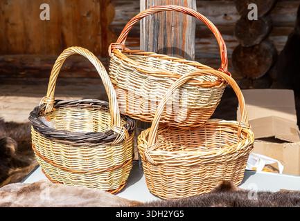 Handmade wicker baskets ready for sale at the local market in summer Stock Photo