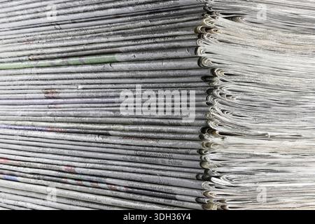 a stack of old newspapers Stock Photo