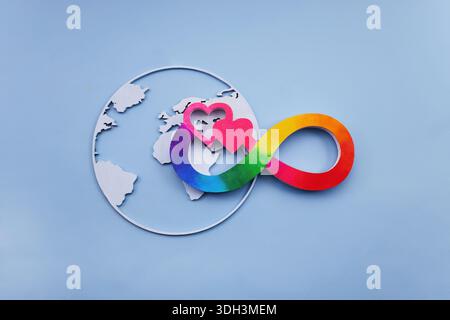 Rainbow infinity symbol, hearts, earth representing neurodiversity inclusion and autism awareness Stock Photo