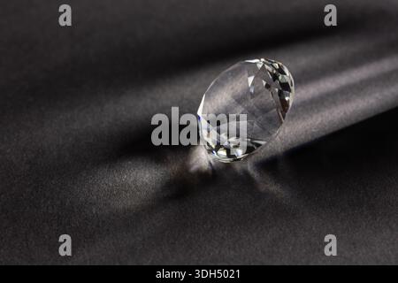 diamond on dark background close up. Stock Photo