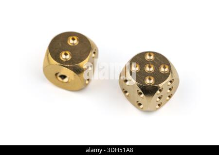 Two golden dice on white background. Stock Photo