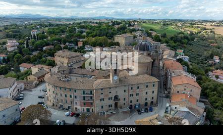 Aerial view of a historic Italian city showcasing its architectural beauty and lush green surroundings. Captured through drone photography, highlighti Stock Photo
