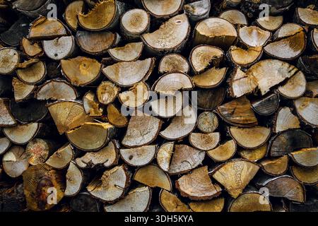 Stacked Cut Firewood Logs Showing Natural Wood Grain Texture Stock Photo