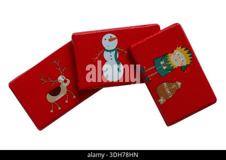 Christmas themed Milk Chocolate Tablets isolated on white background - elf with sack of presents, Rudolph the Red Nosed Reindeer and Snowman Stock Photo