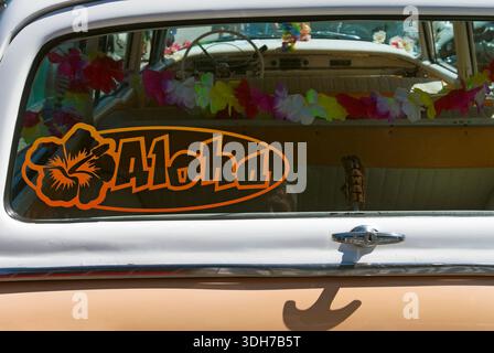 Aloha sticker on rear window of a vintage American car Stock Photo
