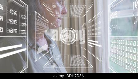 Studying woman in button-up shirt focusing on virtual panels and central HUD in room by curtains Stock Photo