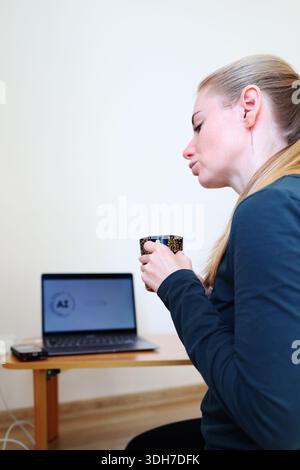 Female professional using AI software on computer for digital work and online business Stock Photo