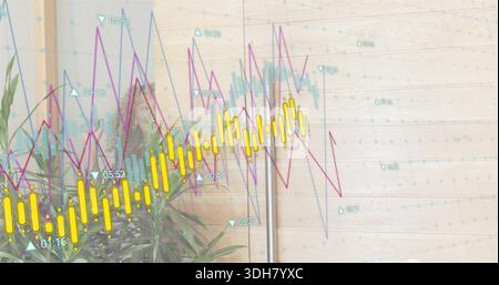 Displaying digital financial charts dominating office wall, showing potted plants and metal handle Stock Photo