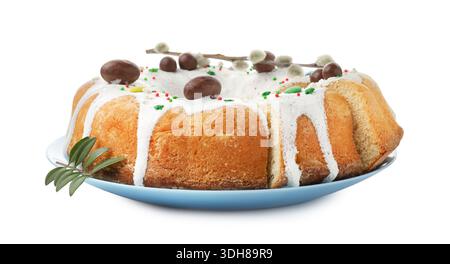 Delicious Easter cake, willow branch and green leaves isolated on white Stock Photo