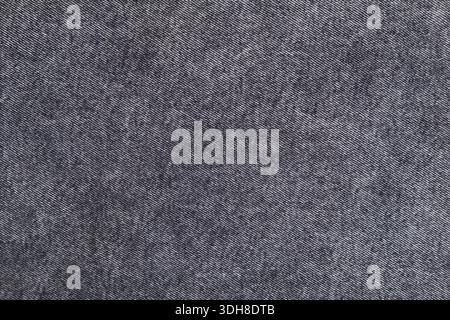 background of gray denim fabric close up. Stock Photo