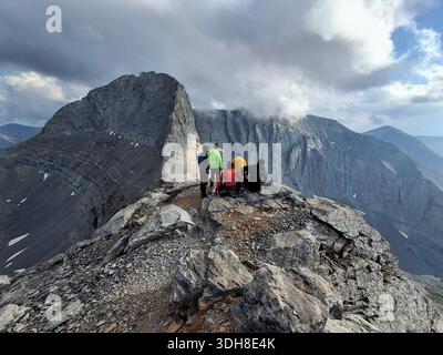 Hikers reaching the summit of Mount Olympus, Greece Stock Photo