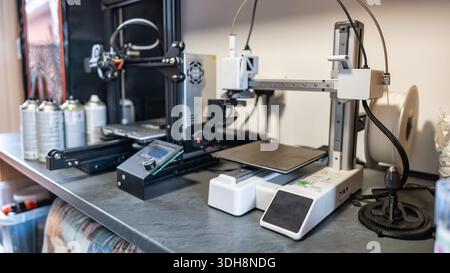 Group of 3d printers to print plastic and resin models in three dimensions. Stock Photo