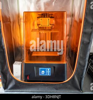 3D printer to print resin models with protective insulating capsule for exterior. Stock Photo