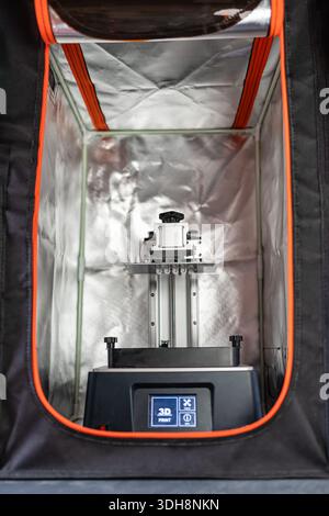 3D printer to print resin models with protective insulating capsule for exterior. Stock Photo